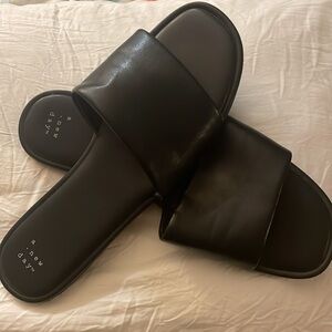 Women’s black flat sandals. Target’s A New Day brand. Size 10.